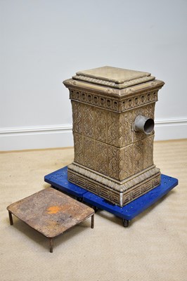 Lot 1225 - A Victorian ceramic stove with pierced and...
