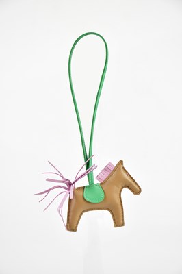 Lot 794 - HERMÈS; a Rodeo PM Chai Mint bag charm made in...