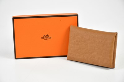 Lot 797 - HERMÈS; an unused Calvi Epsom leather gold...