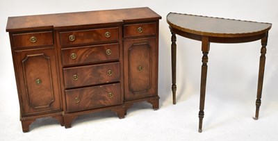 Lot 21 - A reproduction mahogany crossbanded breakfront...