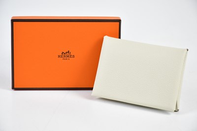 Lot 795 - HERMÈS; an unused Calvi Epsom calfskin leather...