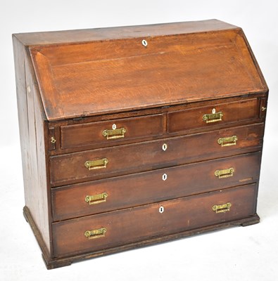 Lot 80 - A George III mahogany crossbanded bureau with...