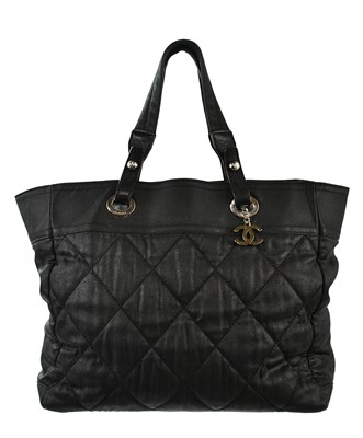 Lot 696 - CHANEL; a Paris-Biarritz quilted coated fabric...