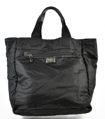 Lot 773 - GIVENCHY; a black nylon reversible camouflage...