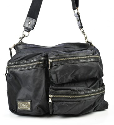 Lot 774 - DOLCE & GABBANA; a man's black nylon and...