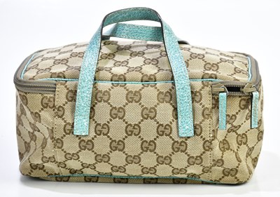 Lot 728 - GUCCI; a GG canvas small vanity cosmetic bag...