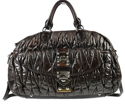 Lot 719 - MIU MIU; a brown leather Barletto bowler bag,...