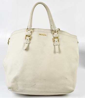 Lot 723 - PRADA; a large cream pebbled leather handbag...