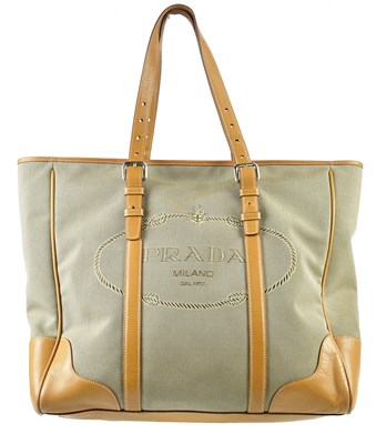 Lot 702 - PRADA; a large brown canvas Canapa handbag...