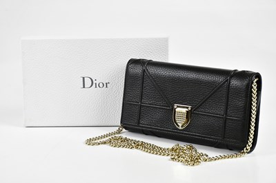 Lot 698 - CHRISTIAN DIOR; an unused black pebbled...