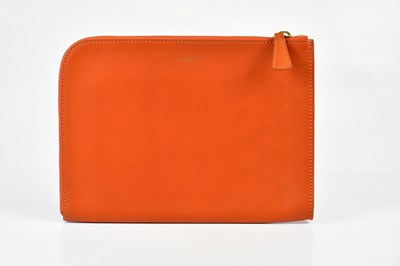 Lot 871 - JOSEPH; a calfskin orange leather iPad holder...