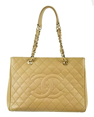 Lot 693 - CHANEL; a cream circa 2014 caviar leather...