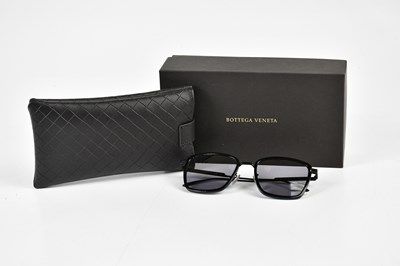 Lot 815 - BOTTEGA VENETA; a pair of unworn black metal...