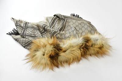 Lot 839 - GUCCI; a silk and wool mixed GG monogram...