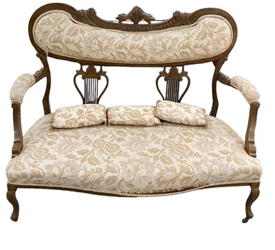 Lot 41 - An early 20th century carved mahogany settee...