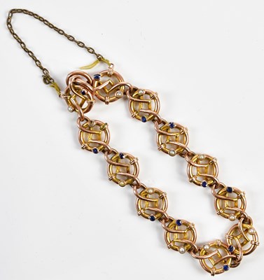 Lot 301 - A 9ct gold sapphire and pearl set bracelet...