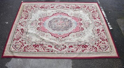 Lot 1203 - An Aubusson style hand woven carpet, worked...