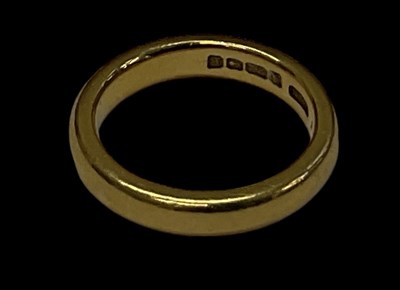 Lot 1458 - A 22ct yellow gold wedding band, size I,...