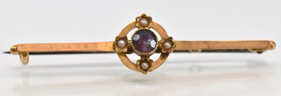 Lot 1535 - A 15ct yellow gold brooch set with central...