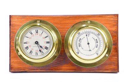 Lot 1524 - CAPTAIN O M WATTS; a brass cased ship's clock...