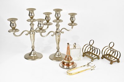 Lot 2048 - A pair of silver plated toast racks, silver...