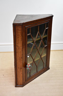 Lot 1187 - An 18th century oak and pine hanging corner...