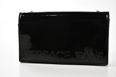 Lot 783 - VERSACE JEANS; a black patent leather clutch...