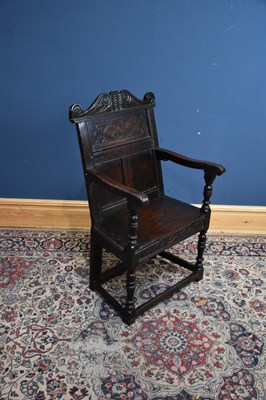 Lot 1174 - An 18th century and later oak wainscot type...