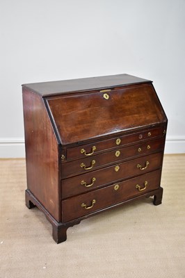 Lot 1027 - An 18th century mahogany bureau, the fall...