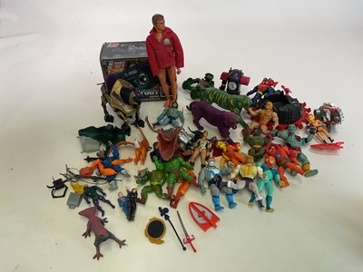 Lot 324 - A box of action figure toys, to include He-Man,...