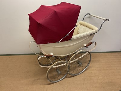 Lot 328 - SILVER CROSS; a large 1960/70 pram, with under...