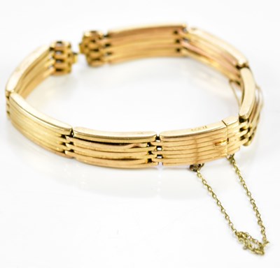 Lot 302 - An 18ct yellow gold watch strap, total approx...