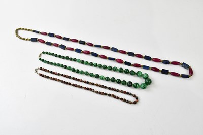 Lot 420 - A malacite beaded necklace, a hardstone...