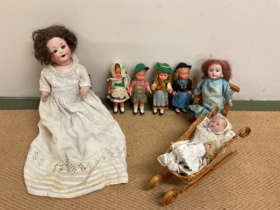 Lot 72 - HEUBACH KOPPLESDORF; a bisque headed doll with...