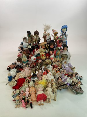 Lot 378 - A large collection of dolls to include costume...