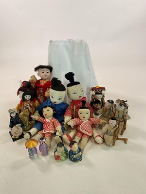 Lot 379 - A group of celluloid, cloth and ceramic...