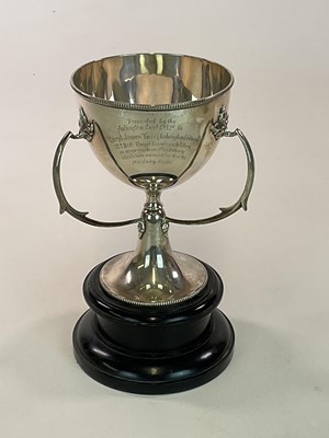 Lot 1021 - A George V hallmarked silver three handled...