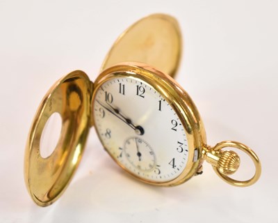 Lot 1291 - An 18ct yellow gold half hunter fob watch with...