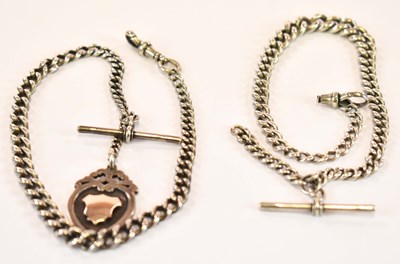 Lot 1303 - Two hallmarked silver Albert chains and a fob,...