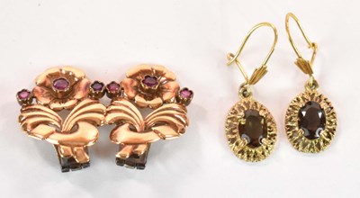 Lot 1164 - A pair of 9ct yellow gold and garnet set...