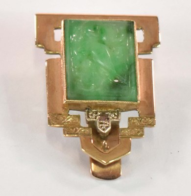Lot 1165 - A 9ct yellow gold carved jade and tiny diamond...