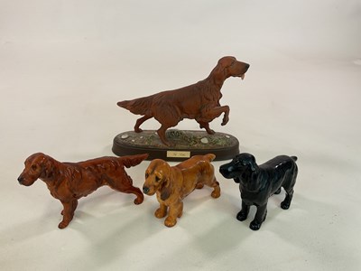 Lot 494 - ROYAL DOULTON AND BESWICK; a dog figures...