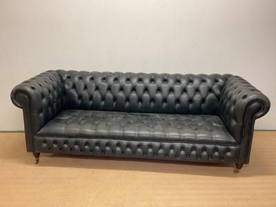Lot 601 - A late 20th century black leather Chesterfield...