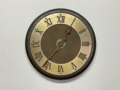 Lot 1340 - A 20th century large wall clock constructed of...