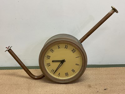 Lot 1351 - A mid 20th century double sided brass and...