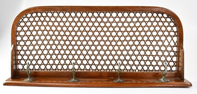 Lot 91 - A wall-hanging wooden hat rack with bergère...