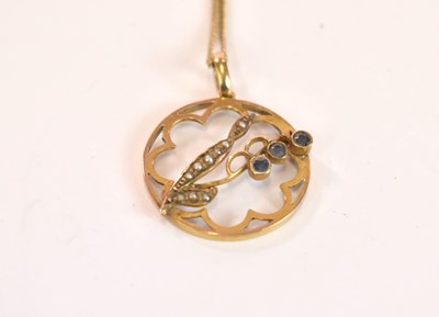 Lot 1201 - A 9ct yellow gold circular floral pendant set...