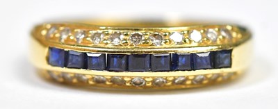 Lot 961 - An 18ct gold diamond and sapphire ring, the...