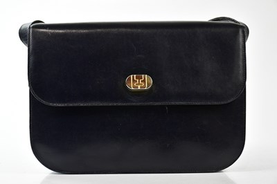 Lot 784 - SALVATORE FERRAGAMO; a navy blue vintage...