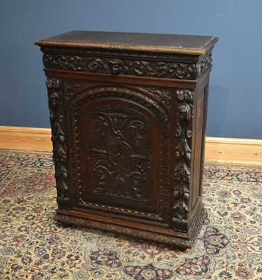 Lot 1180 - A 19th century Flemish style carved oak side...